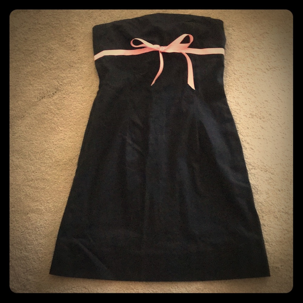 Black strapless dress with pink bow
